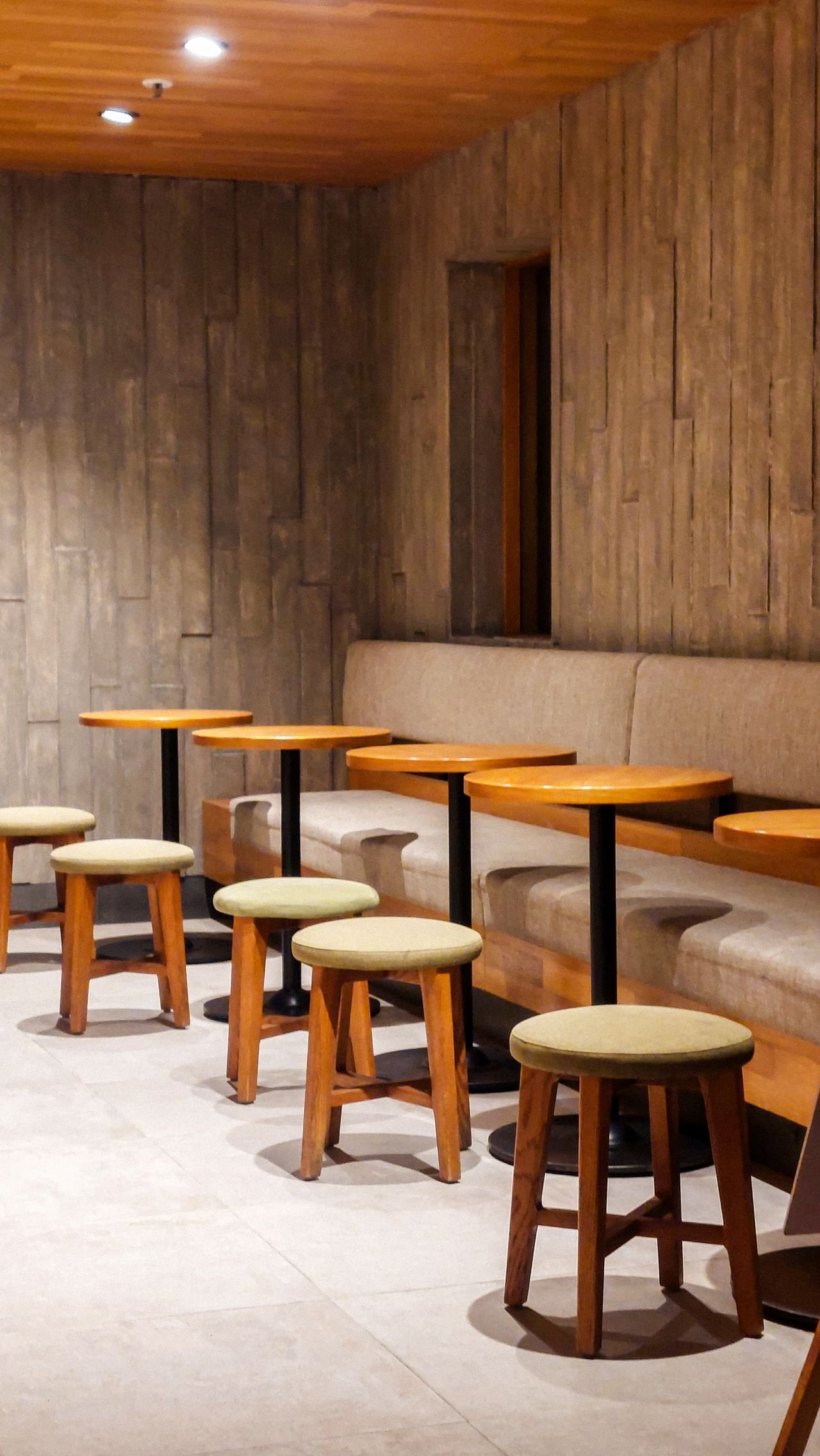 Cafe interior with handcrafted wood chairs and tables