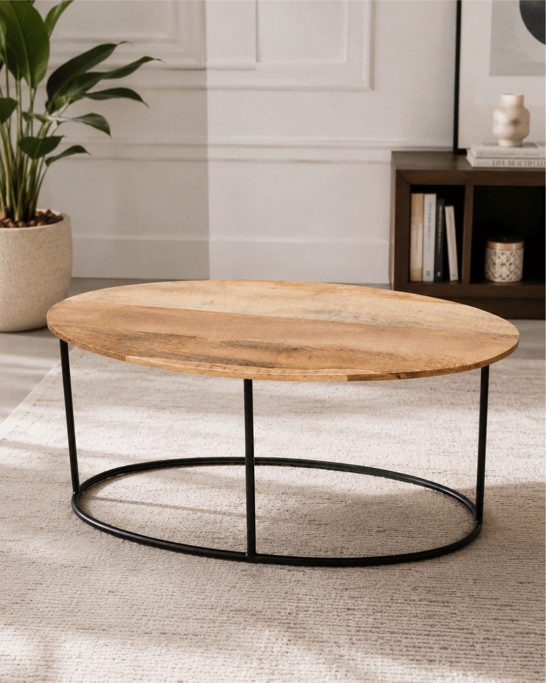 Oval Mango Wood Coffee Table with Round Black Metal Base