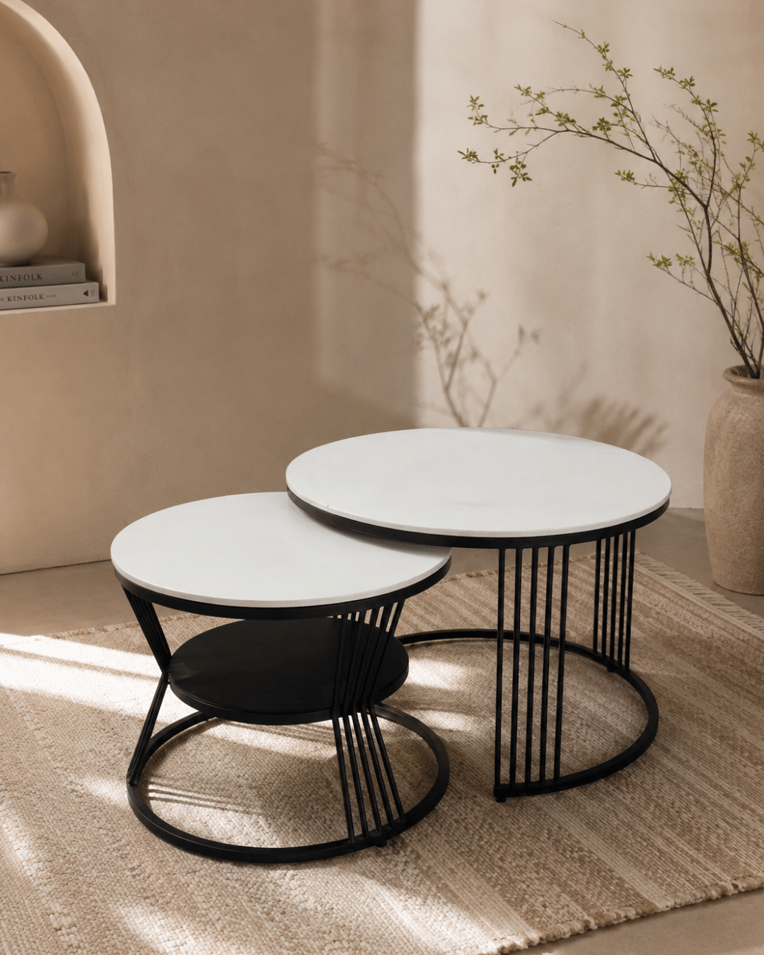 Round White Top Nesting Coffee Tables with Black Spindle Legs & Shelf (Set of 2)